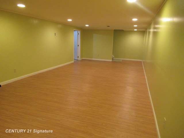 unfurnished room with light hardwood / wood-style floors