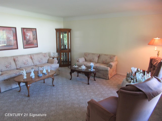 carpeted living room featuring crown molding