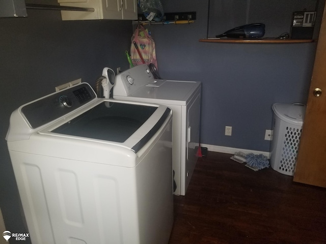 5439 Richfield Rd, Flint, MI 48506 - laundry area featuring independent washer and dryer, wood finished floors, and cabinet space