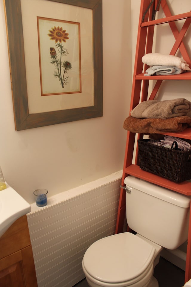 bathroom with vanity and toilet