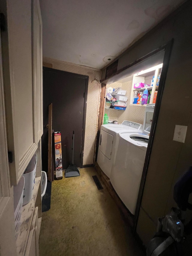 laundry area with cabinets and washer and dryer