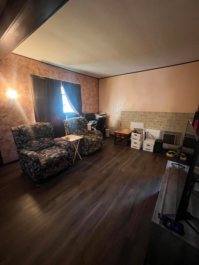 living area with dark hardwood / wood-style floors