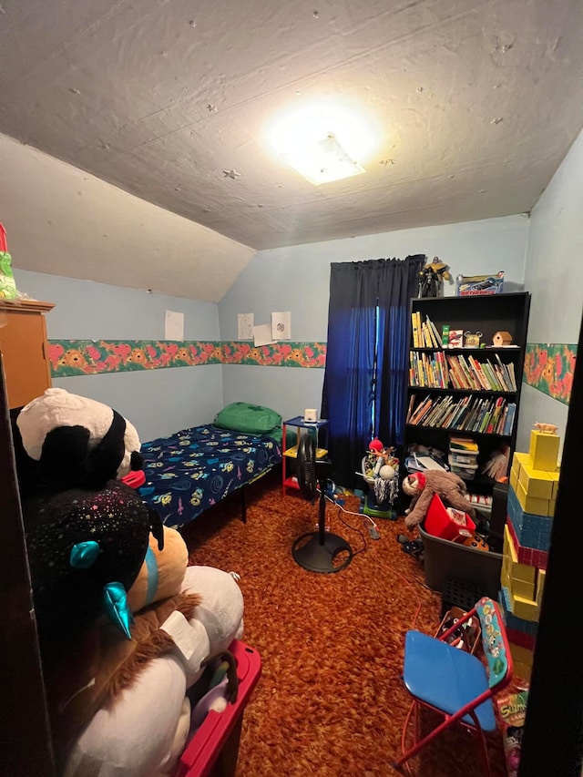 bedroom featuring lofted ceiling