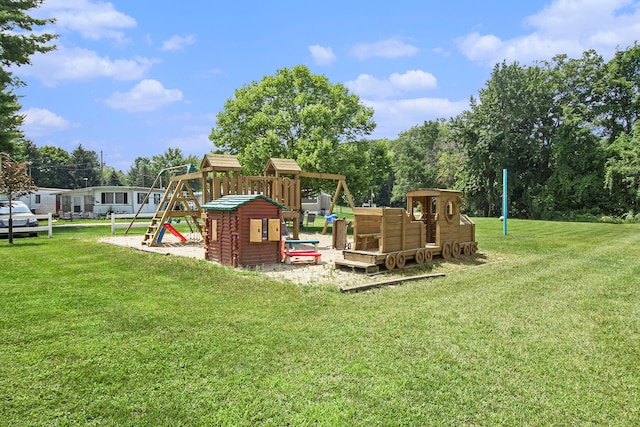 view of jungle gym with a lawn