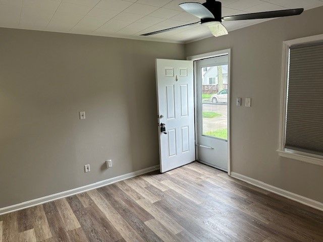 entryway with ceiling fan and light hardwood / wood-style floors