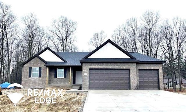 view of front of home with a garage