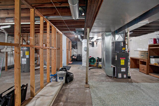 basement featuring electric water heater