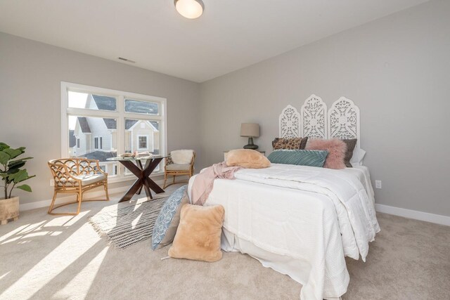 637 Woodland Dr, Dexter, MI 48130 - carpeted bedroom featuring baseboards