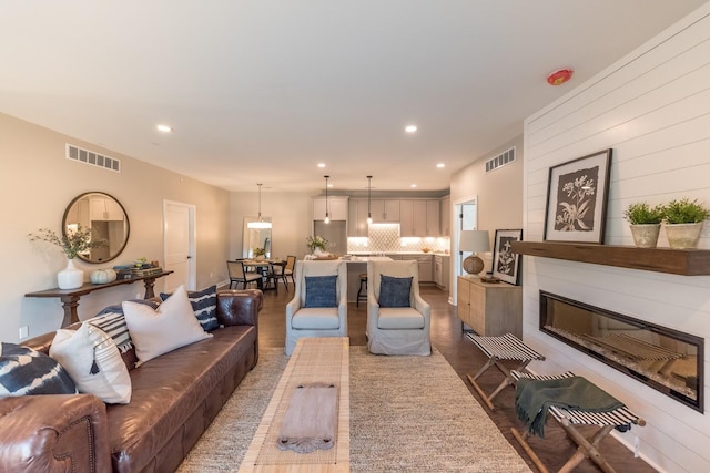 637 Woodland Dr, Dexter, MI 48130 - living area featuring recessed lighting