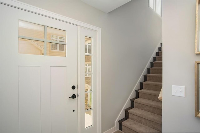 637 Woodland Dr, Dexter, MI 48130 - entryway featuring stairs