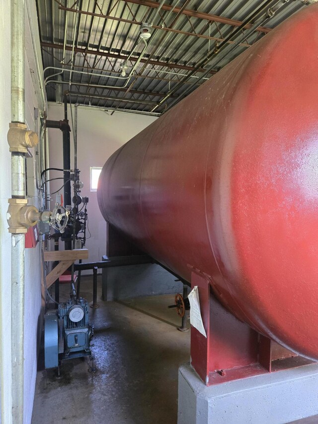 9284 M-35, Gladstone, MI 49837 - garage featuring oil tank