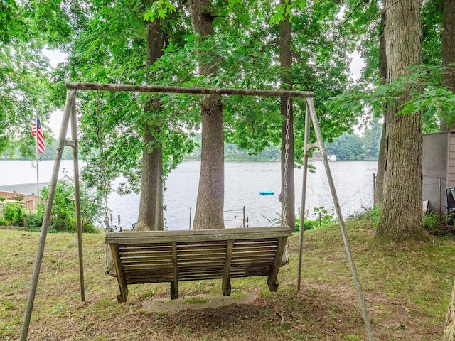 view of home's community with a water view