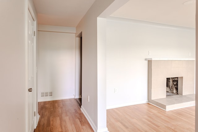 corridor featuring hardwood / wood-style flooring