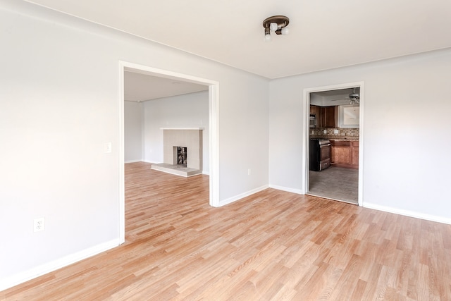 unfurnished room featuring light hardwood / wood-style flooring