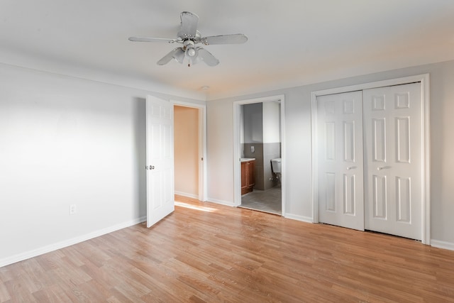 unfurnished bedroom with ceiling fan, light hardwood / wood-style flooring, and ensuite bathroom