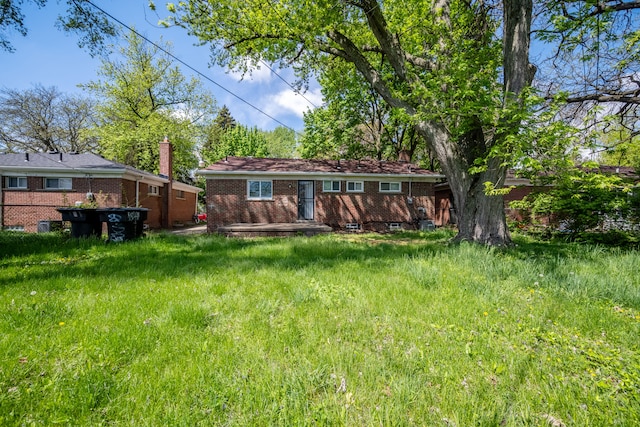 back of property with brick siding