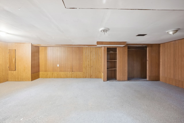 finished basement with wooden walls