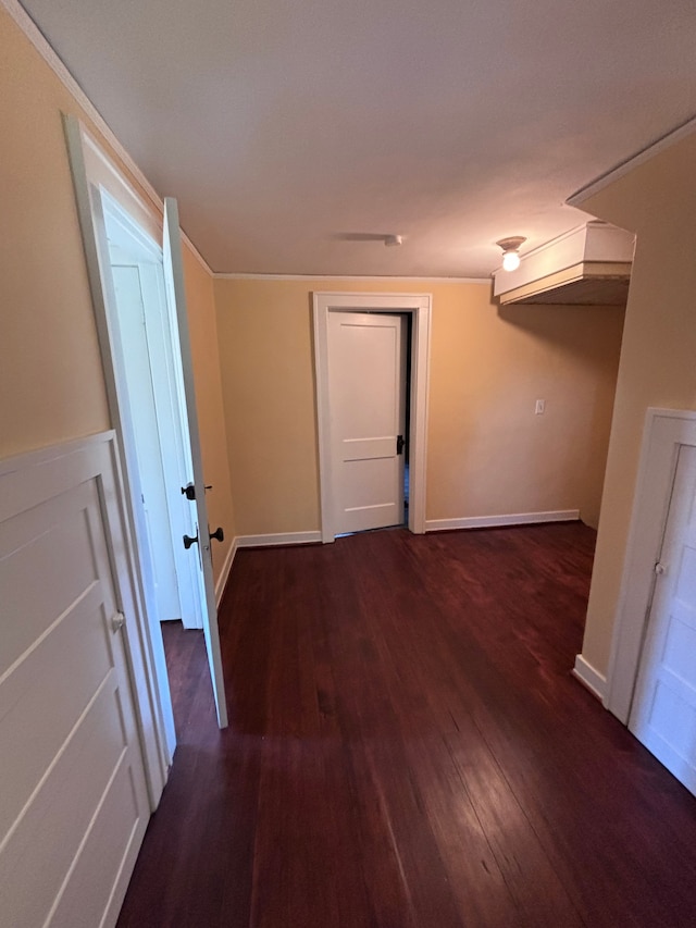 corridor with dark wood-type flooring