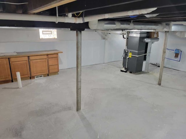 basement with heating unit