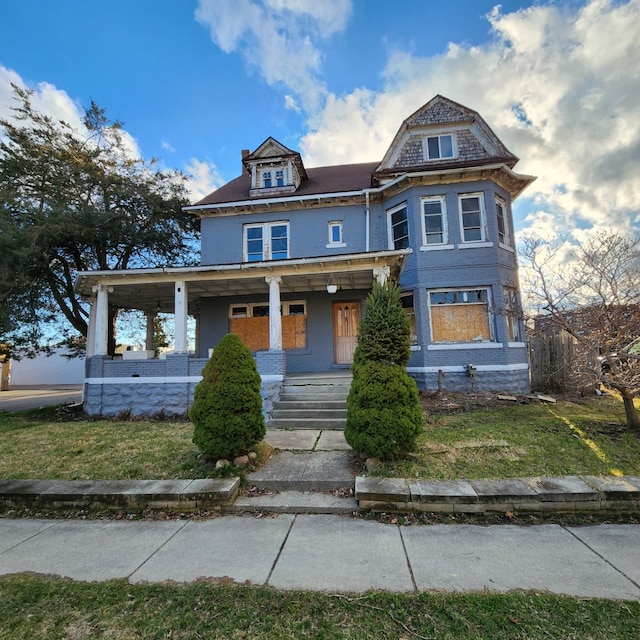 victorian home featuring a porch