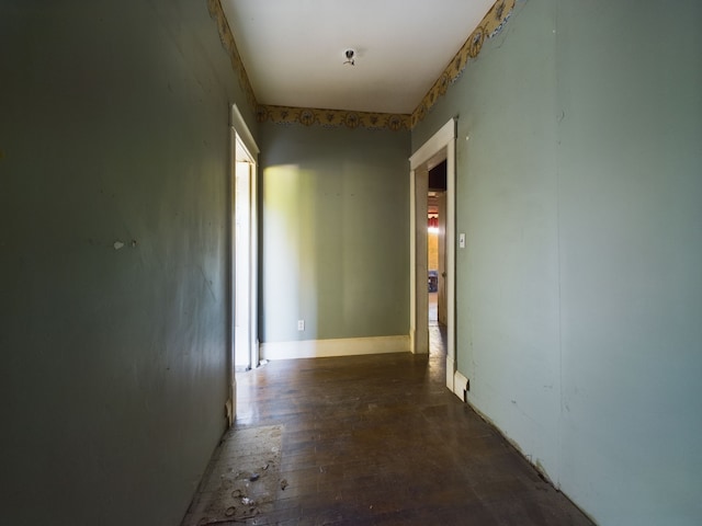 hall with dark wood-type flooring