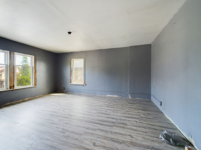spare room featuring light hardwood / wood-style floors