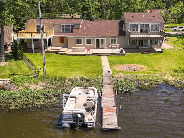 1794 S Hughes Rd, Brighton, MI 48114 - back of property with a deck with water view and a balcony