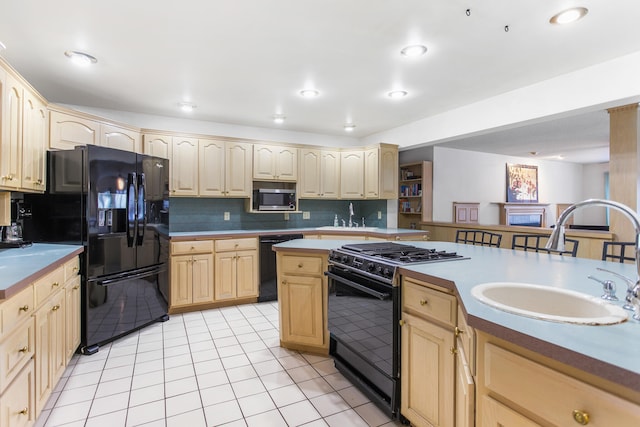 kitchen featuring sink, light brown cabinets, backsplash, light tile patterned flooring, and black appliances