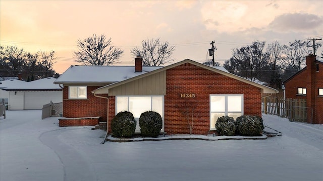 view of snow covered property