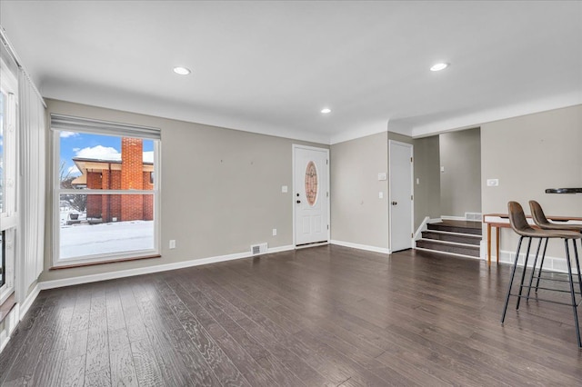 living room featuring dark hardwood / wood-style flooring