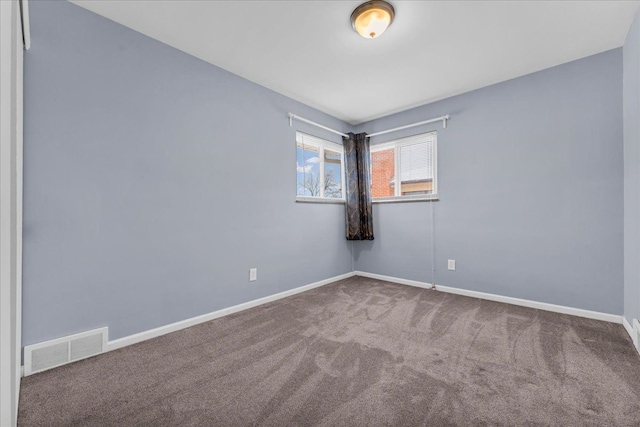 unfurnished room with carpet flooring