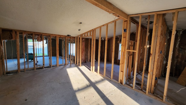 7306 N Bray Rd, Mount Morris, MI 48458 - miscellaneous room featuring a textured ceiling