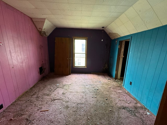 bonus room featuring vaulted ceiling