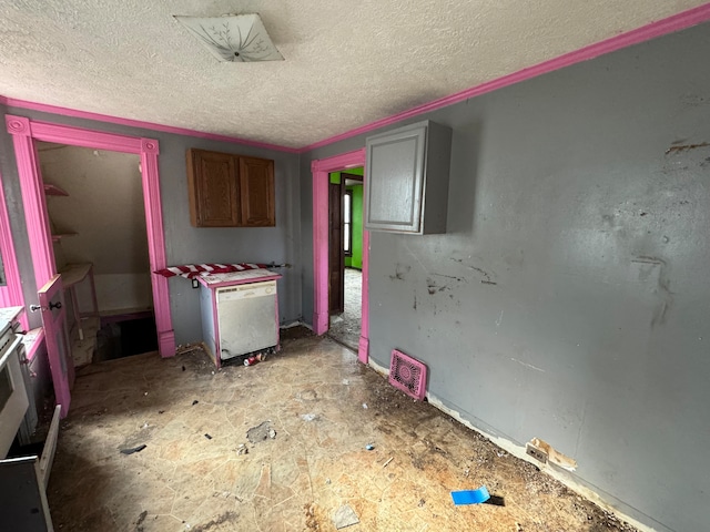 kitchen with a textured ceiling