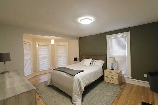 bedroom with light hardwood / wood-style flooring