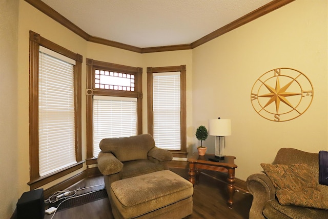 living room featuring ornamental molding and hardwood / wood-style flooring