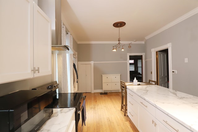 kitchen with white cabinetry, hanging light fixtures, crown molding, stainless steel electric stove, and light wood-type flooring