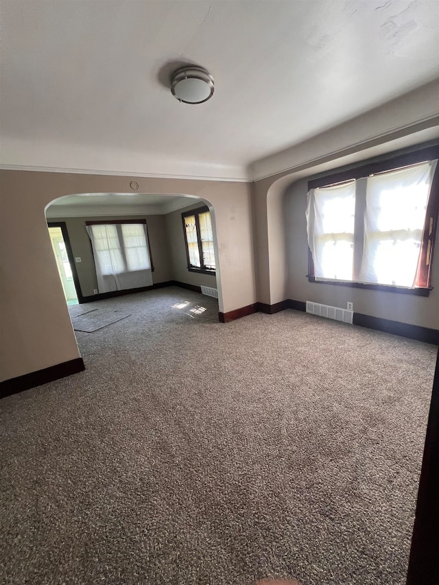 unfurnished room featuring carpet flooring