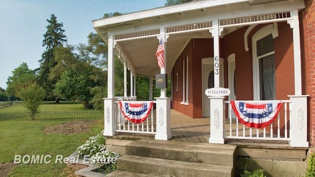 doorway to property featuring a porch