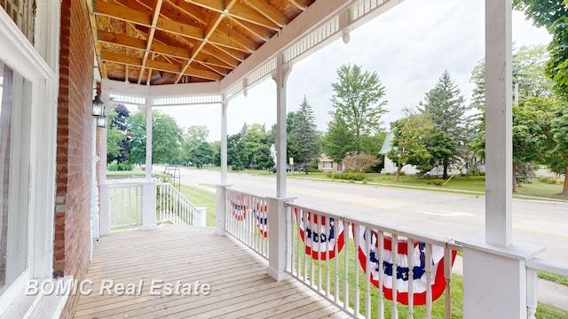 wooden terrace with covered porch