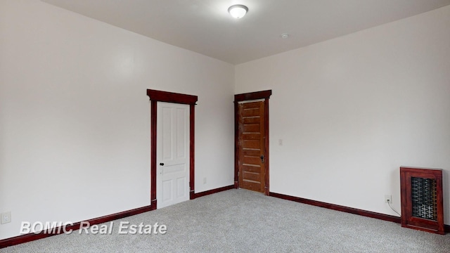 empty room with carpet floors