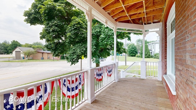 wooden terrace with covered porch