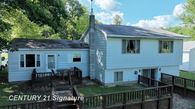 rear view of house with a deck