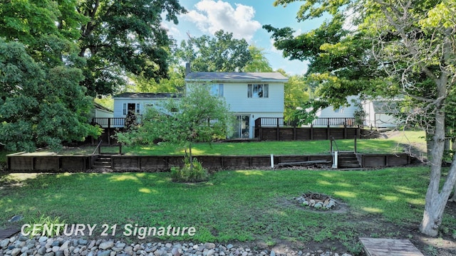 view of yard with a wooden deck