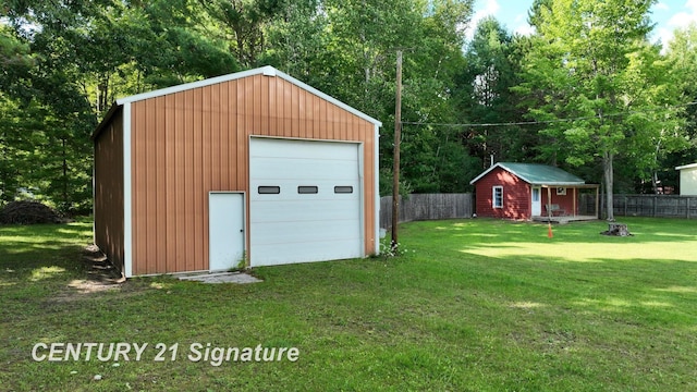 garage with a yard