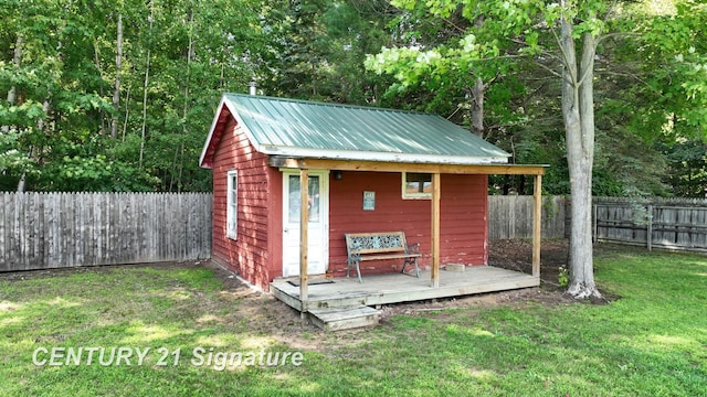 view of outdoor structure with a lawn