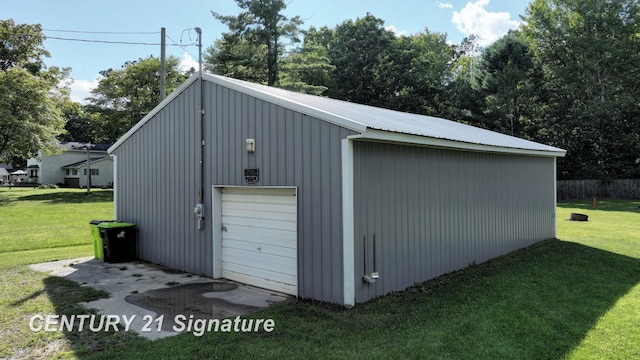 garage with a yard