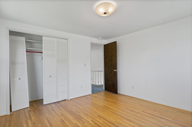 unfurnished bedroom featuring light hardwood / wood-style floors