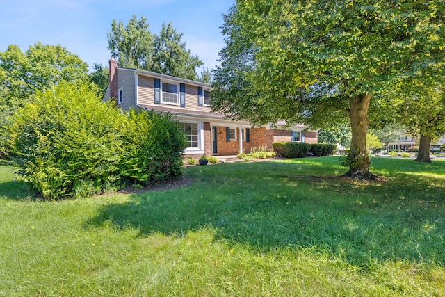 view of front of property with a front lawn