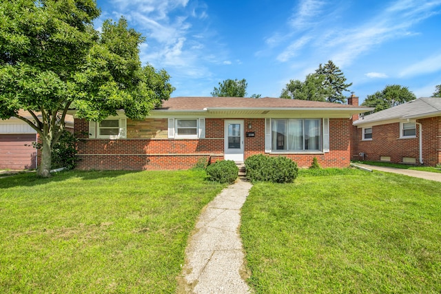 view of front facade featuring a front yard